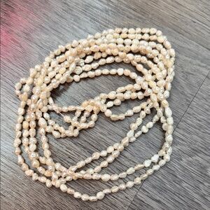 2 strings of fresh water Cream Pearl Necklaces